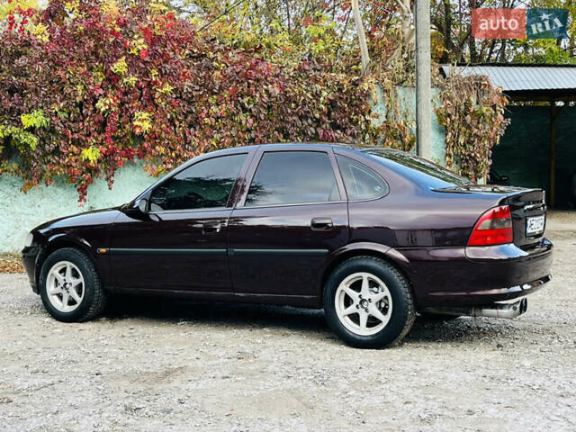 Опель Вектра 1997 в Каменское - Днепродзержинск на Automoto.ua Красный Опель Вектра, объемом двигателя 1.78 л и пробегом 350 тыс. км за 3499 $, фото 12 на Automoto.ua