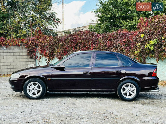 Опель Вектра 1997 в Каменское - Днепродзержинск на Automoto.ua Красный Опель Вектра, объемом двигателя 1.78 л и пробегом 350 тыс. км за 3499 $, фото 10 на Automoto.ua