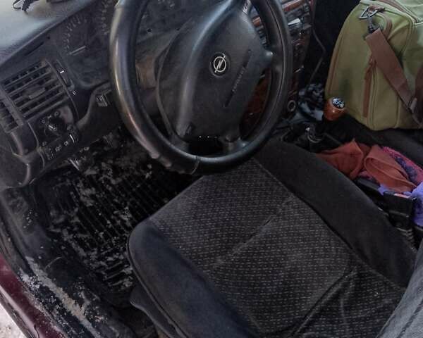 Красный Опель Вектра, объемом двигателя 2 л и пробегом 330 тыс. км за 850 $, фото 6 на Automoto.ua