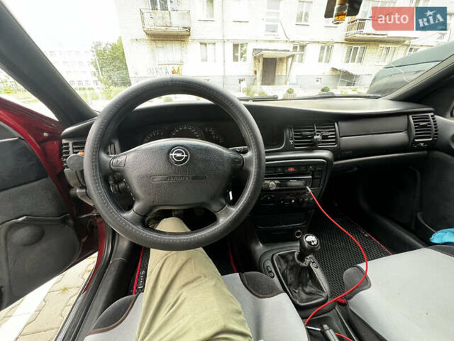 Червоний Опель Вектра, об'ємом двигуна 1.8 л та пробігом 370 тис. км за 2000 $, фото 8 на Automoto.ua