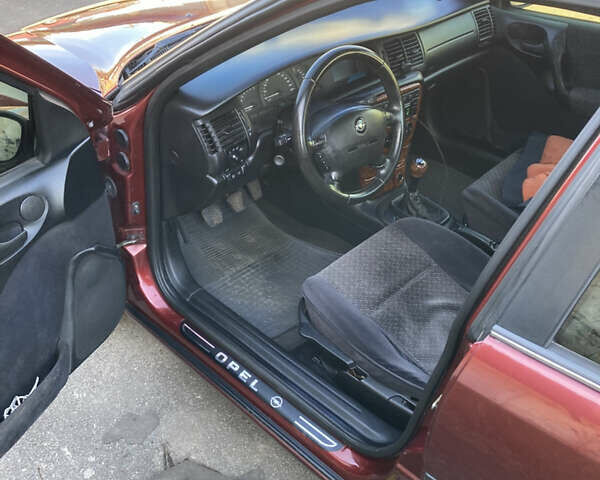 Червоний Опель Вектра, об'ємом двигуна 1.8 л та пробігом 287 тис. км за 2500 $, фото 16 на Automoto.ua