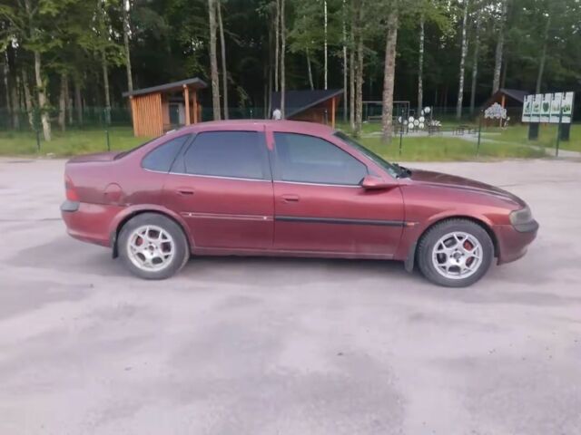 Красный Опель Вектра, объемом двигателя 1.8 л и пробегом 410 тыс. км за 2000 $, фото 2 на Automoto.ua