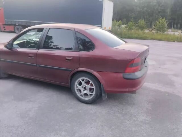 Красный Опель Вектра, объемом двигателя 1.8 л и пробегом 410 тыс. км за 2000 $, фото 3 на Automoto.ua