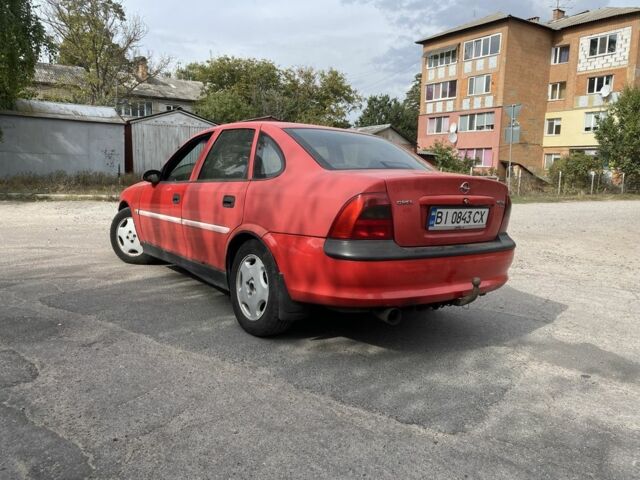 Красный Опель Вектра, объемом двигателя 1.8 л и пробегом 350 тыс. км за 999 $, фото 1 на Automoto.ua