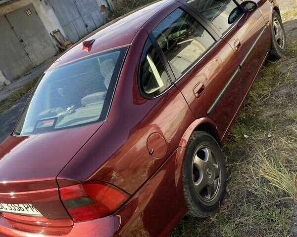 Червоний Опель Вектра, об'ємом двигуна 1.8 л та пробігом 287 тис. км за 2500 $, фото 13 на Automoto.ua
