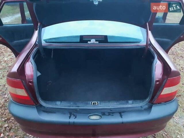 Червоний Опель Вектра, об'ємом двигуна 1.8 л та пробігом 302 тис. км за 1700 $, фото 15 на Automoto.ua