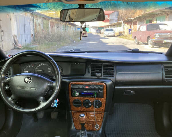 Червоний Опель Вектра, об'ємом двигуна 1.8 л та пробігом 287 тис. км за 2500 $, фото 21 на Automoto.ua