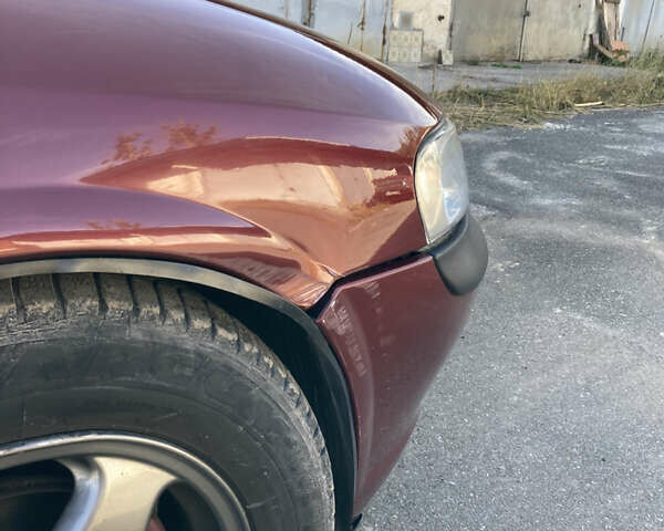 Червоний Опель Вектра, об'ємом двигуна 1.8 л та пробігом 287 тис. км за 2500 $, фото 9 на Automoto.ua