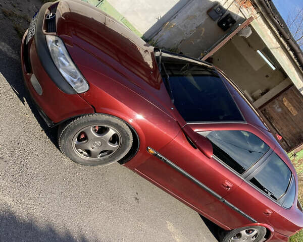 Червоний Опель Вектра, об'ємом двигуна 1.8 л та пробігом 287 тис. км за 2500 $, фото 11 на Automoto.ua