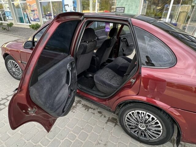 Красный Опель Вектра, объемом двигателя 1.8 л и пробегом 286 тыс. км за 2300 $, фото 6 на Automoto.ua