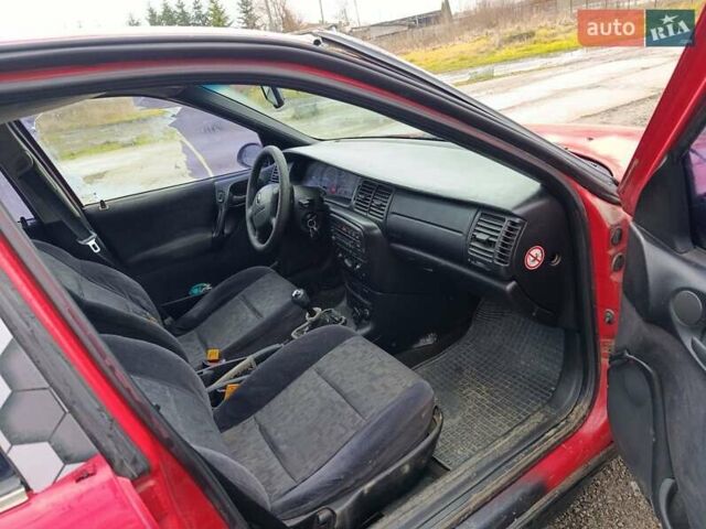 Красный Опель Вектра, объемом двигателя 1.6 л и пробегом 409 тыс. км за 1250 $, фото 9 на Automoto.ua
