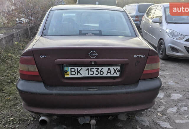 Красный Опель Вектра, объемом двигателя 1.8 л и пробегом 200 тыс. км за 999 $, фото 5 на Automoto.ua