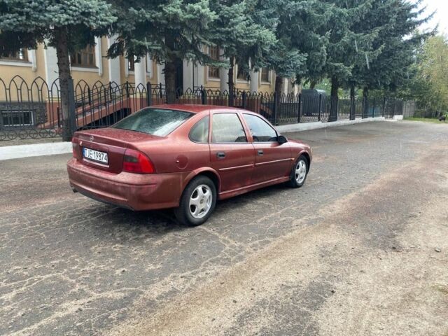 Красный Опель Вектра, объемом двигателя 1.8 л и пробегом 275 тыс. км за 1250 $, фото 3 на Automoto.ua