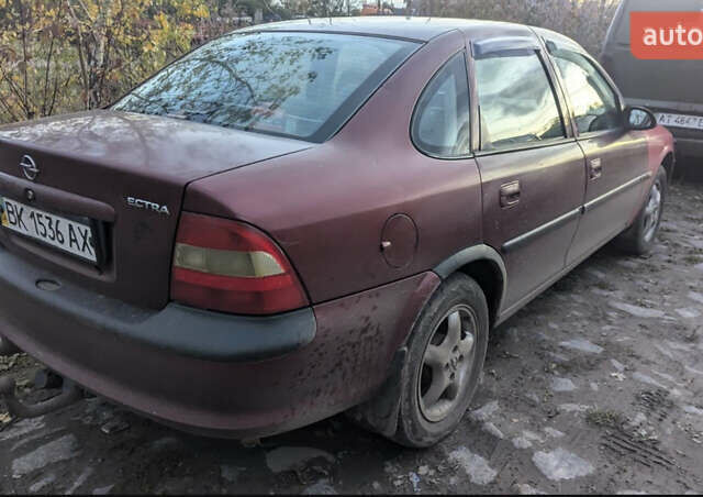 Красный Опель Вектра, объемом двигателя 1.8 л и пробегом 200 тыс. км за 999 $, фото 6 на Automoto.ua