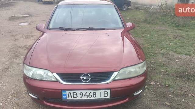 Красный Опель Вектра, объемом двигателя 1.8 л и пробегом 280 тыс. км за 2750 $, фото 4 на Automoto.ua