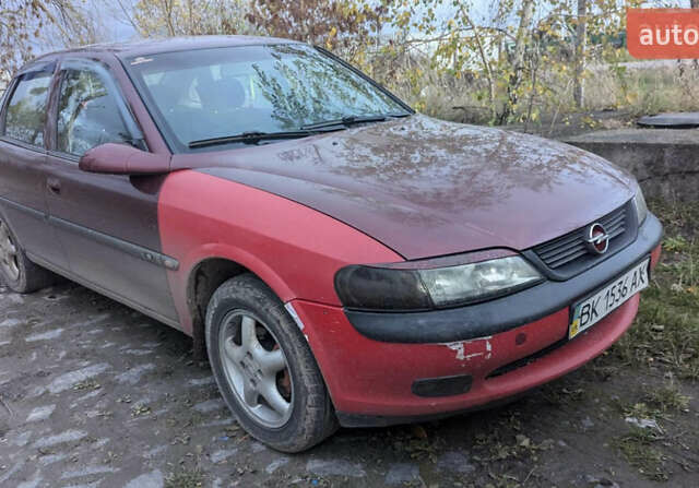 Красный Опель Вектра, объемом двигателя 1.8 л и пробегом 200 тыс. км за 999 $, фото 2 на Automoto.ua