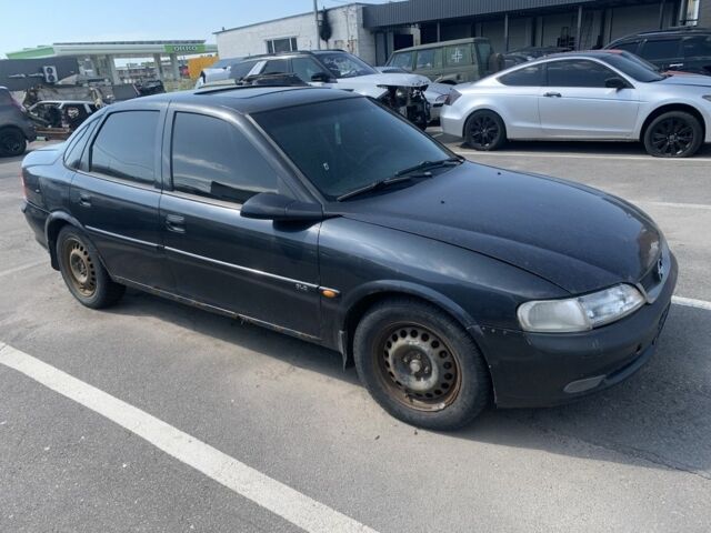 Красный Опель Вектра, объемом двигателя 1.6 л и пробегом 250 тыс. км за 600 $, фото 4 на Automoto.ua