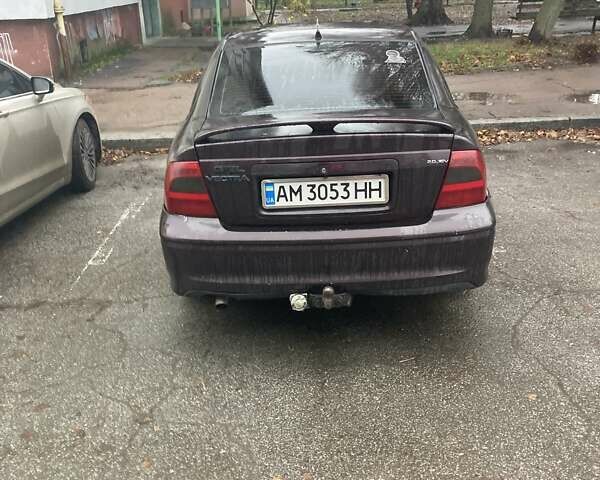 Красный Опель Вектра, объемом двигателя 2 л и пробегом 396 тыс. км за 2500 $, фото 3 на Automoto.ua