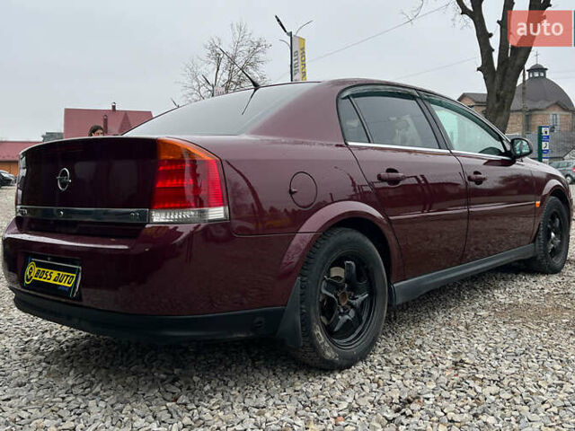 Красный Опель Вектра, объемом двигателя 2.2 л и пробегом 284 тыс. км за 4299 $, фото 6 на Automoto.ua