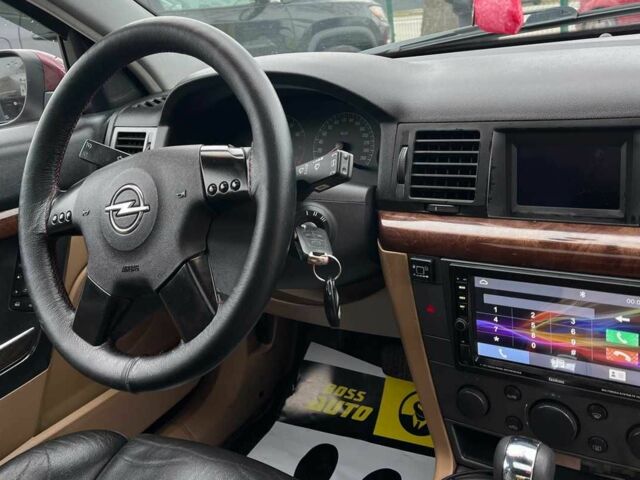 Красный Опель Вектра, объемом двигателя 2.2 л и пробегом 284 тыс. км за 4299 $, фото 12 на Automoto.ua