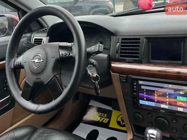 Красный Опель Вектра, объемом двигателя 2.2 л и пробегом 284 тыс. км за 4299 $, фото 12 на Automoto.ua