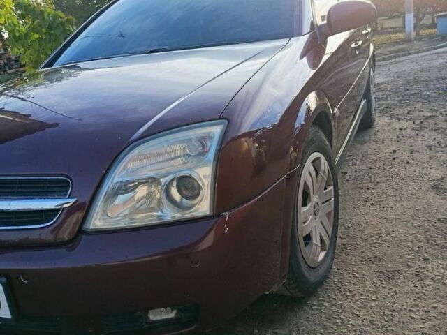 Красный Опель Вектра, объемом двигателя 2 л и пробегом 394 тыс. км за 2000 $, фото 1 на Automoto.ua