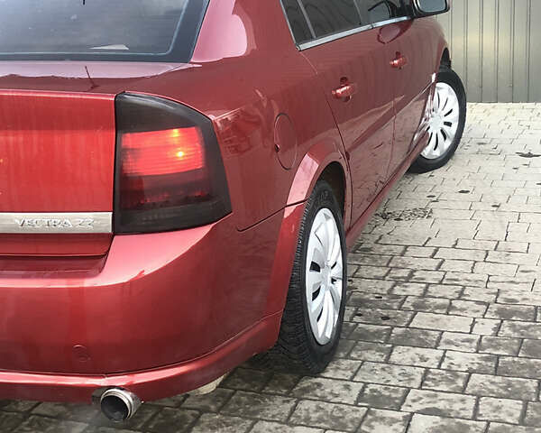 Красный Опель Вектра, объемом двигателя 2.2 л и пробегом 290 тыс. км за 4600 $, фото 6 на Automoto.ua
