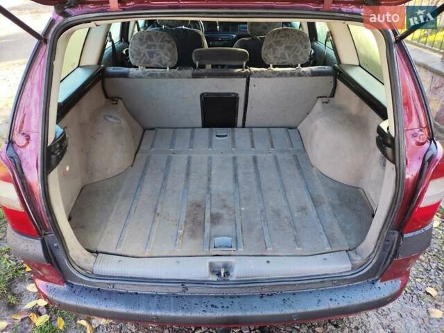 Червоний Опель Вектра, об'ємом двигуна 1.6 л та пробігом 285 тис. км за 1249 $, фото 8 на Automoto.ua