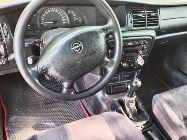 Червоний Опель Вектра, об'ємом двигуна 2 л та пробігом 323 тис. км за 1400 $, фото 4 на Automoto.ua