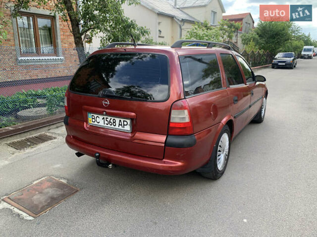 Красный Опель Вектра, объемом двигателя 1.8 л и пробегом 255 тыс. км за 2000 $, фото 4 на Automoto.ua