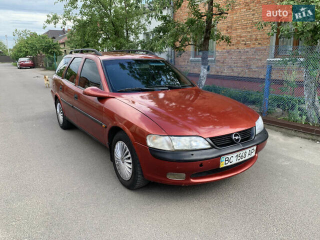 Красный Опель Вектра, объемом двигателя 1.8 л и пробегом 255 тыс. км за 2000 $, фото 2 на Automoto.ua