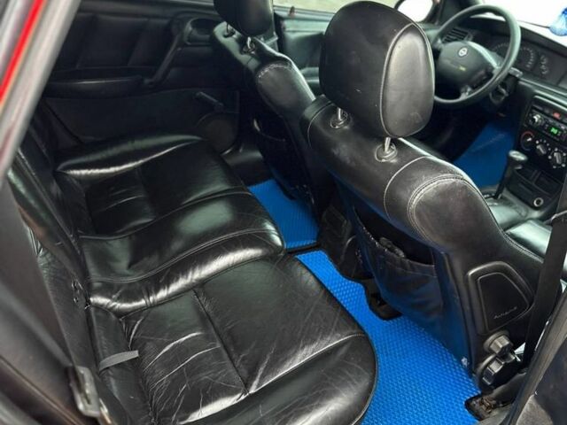 Червоний Опель Вектра, об'ємом двигуна 1.8 л та пробігом 350 тис. км за 1650 $, фото 9 на Automoto.ua