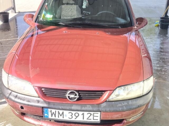 Червоний Опель Вектра, об'ємом двигуна 2 л та пробігом 323 тис. км за 1400 $, фото 3 на Automoto.ua