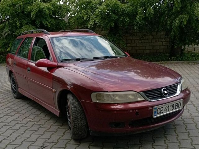 Красный Опель Вектра, объемом двигателя 1.6 л и пробегом 270 тыс. км за 2000 $, фото 1 на Automoto.ua
