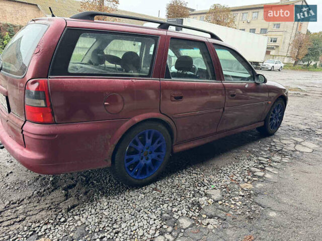 Червоний Опель Вектра, об'ємом двигуна 2 л та пробігом 300 тис. км за 850 $, фото 13 на Automoto.ua