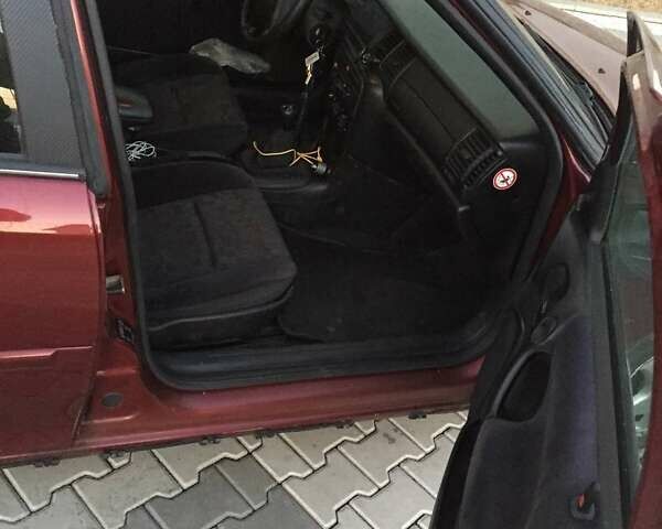 Красный Опель Вектра, объемом двигателя 2 л и пробегом 350 тыс. км за 2668 $, фото 6 на Automoto.ua