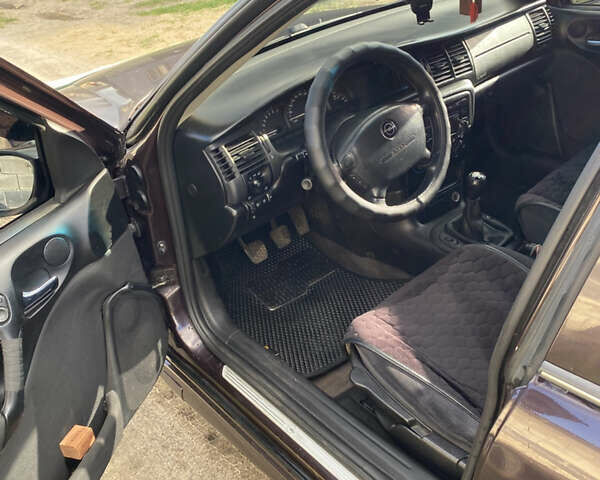 Червоний Опель Вектра, об'ємом двигуна 1.6 л та пробігом 210 тис. км за 2900 $, фото 3 на Automoto.ua