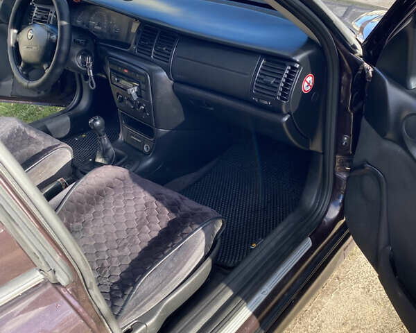 Червоний Опель Вектра, об'ємом двигуна 1.6 л та пробігом 210 тис. км за 2900 $, фото 6 на Automoto.ua