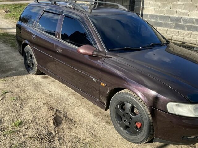 Красный Опель Вектра, объемом двигателя 1.6 л и пробегом 210 тыс. км за 2900 $, фото 1 на Automoto.ua