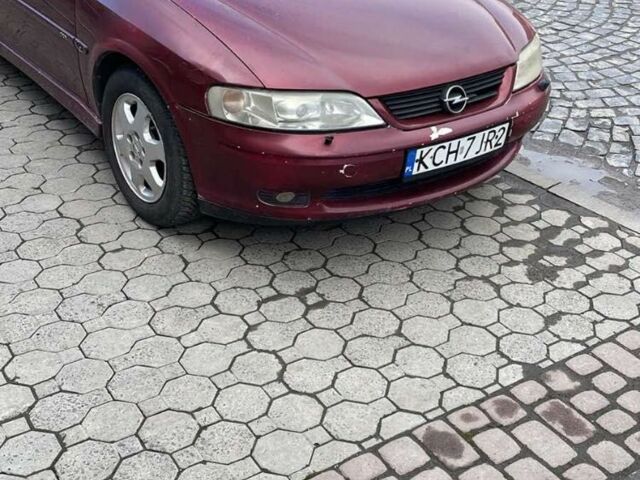 Красный Опель Вектра, объемом двигателя 2.2 л и пробегом 169 тыс. км за 1000 $, фото 4 на Automoto.ua