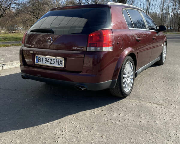 Красный Опель Вектра, объемом двигателя 2.2 л и пробегом 199 тыс. км за 4550 $, фото 3 на Automoto.ua
