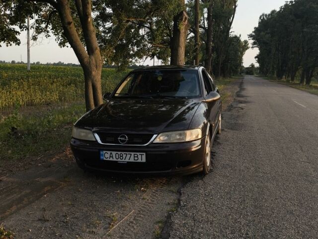 Червоний Опель Вектра, об'ємом двигуна 1 л та пробігом 370 тис. км за 2500 $, фото 3 на Automoto.ua