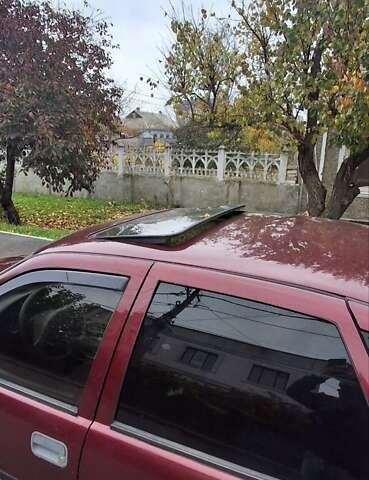 Красный Опель Вектра, объемом двигателя 2 л и пробегом 322 тыс. км за 1450 $, фото 3 на Automoto.ua