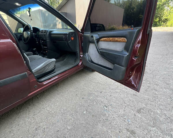 Красный Опель Вектра, объемом двигателя 2 л и пробегом 371 тыс. км за 2299 $, фото 16 на Automoto.ua