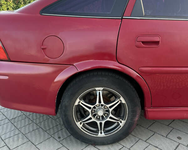 Опель Вектра 2000 в Львове на Automoto.ua Красный Опель Вектра, объемом двигателя 2 л и пробегом 387 тыс. км за 2200 $, фото 10 на Automoto.ua