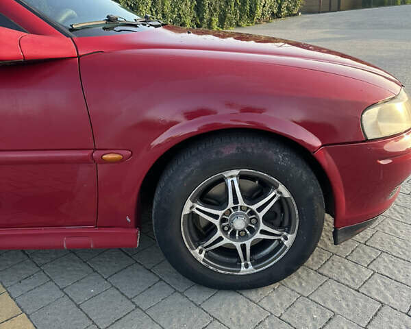 Опель Вектра 2000 в Львове на Automoto.ua Красный Опель Вектра, объемом двигателя 2 л и пробегом 387 тыс. км за 2200 $, фото 9 на Automoto.ua