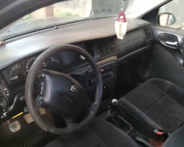 Опель Вектра, объемом двигателя 1.8 л и пробегом 300 тыс. км за 600 $, фото 2 на Automoto.ua