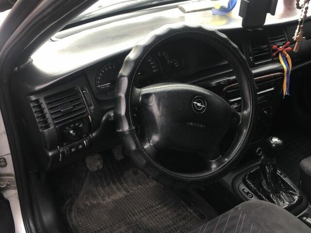 Серый Опель Вектра, объемом двигателя 2 л и пробегом 395 тыс. км за 1016 $, фото 4 на Automoto.ua