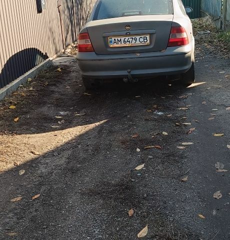 Серый Опель Вектра, объемом двигателя 1.6 л и пробегом 457 тыс. км за 1300 $, фото 2 на Automoto.ua