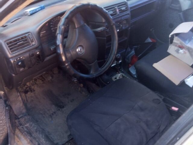 Серый Опель Вектра, объемом двигателя 1.6 л и пробегом 340 тыс. км за 600 $, фото 4 на Automoto.ua